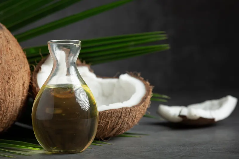 Organic coconut oil massage at home in Dubai — nourishing full-body oil massage